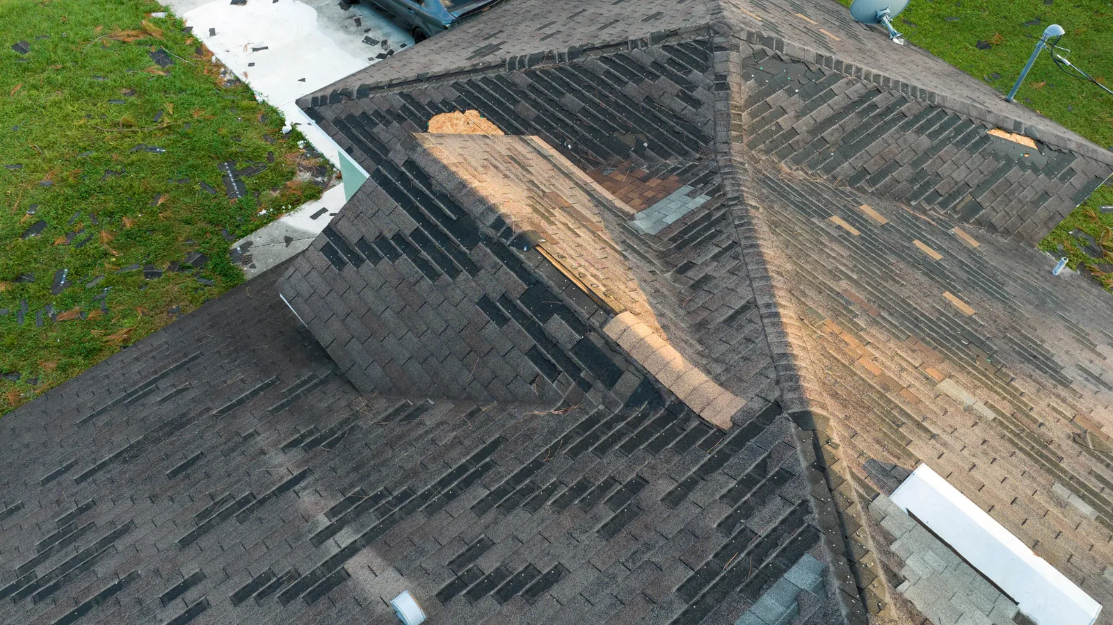 Roof valleys and ridges with shingles stripped to bare wood